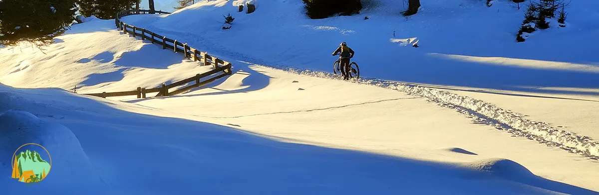 in bici sulla neve a merano2000